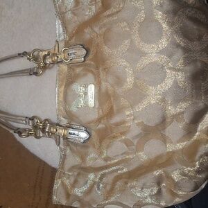 Gold coach purse